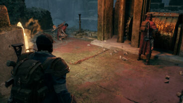 Three different player characters stand around looking at a puzzle in Remnant 2