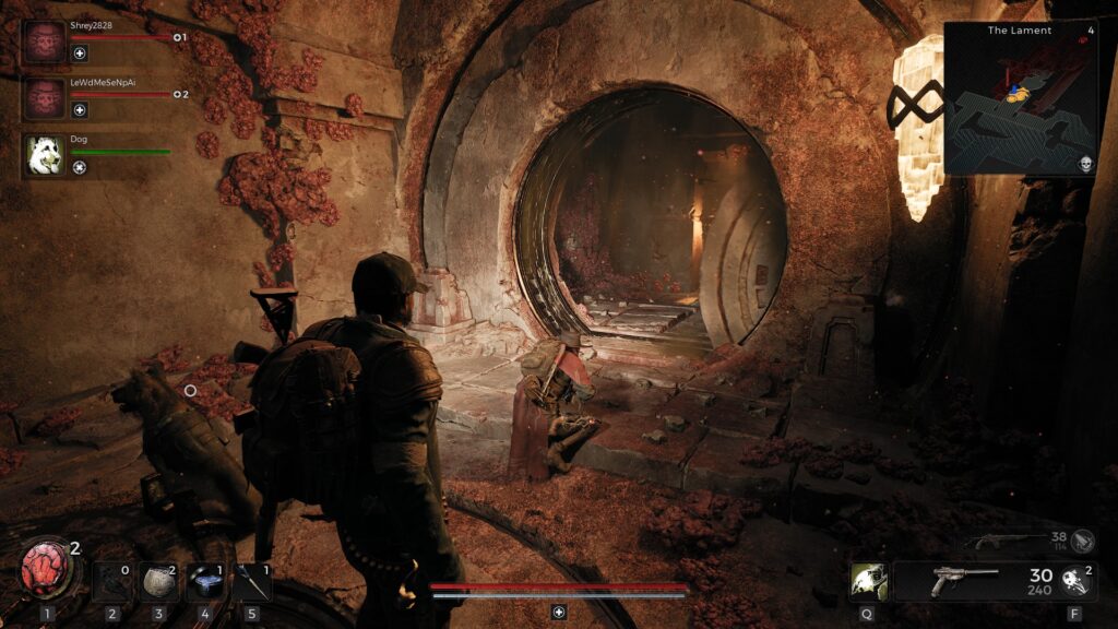 Two players and a dog stand in front of an open vault door after solving a puzzle
