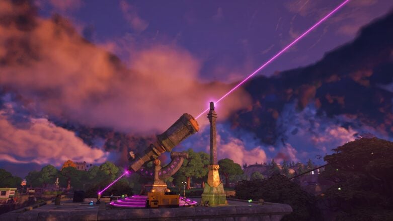 Un gran dispositivo parecido a un telescopio proyecta un gran láser hacia el cielo