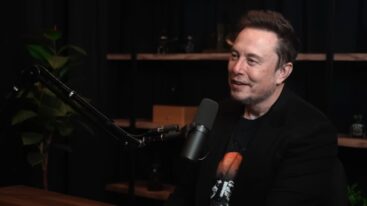 Elon Musk Speaking Into Microphone