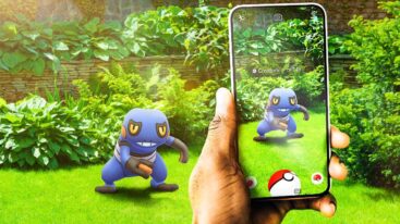 Pokemon Go Blue Monster Smiling With Phone