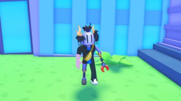 Roblox Ronaldo Clicker Avatar Wearing Silver Helmet Standing Near Blue Building On Grass