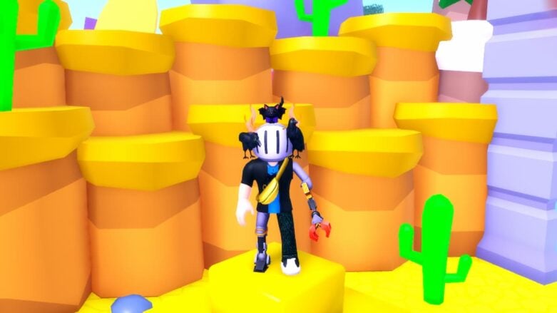 Roblox Ishowspeed Clicker Avatar Wearing Silver Helmet And Metal Claw Left Arm Standing On Top Of Square Pyramid