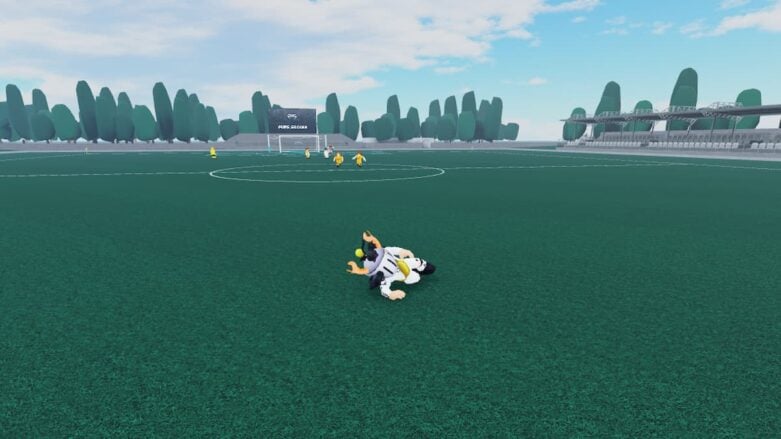 Roblox Pure Soccer Avatar Wearing Silver Helmet Sliding On Ground On Dark Green Pitch