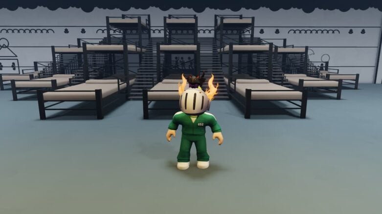 Roblox Squid Game The Final Games Avatar Wearing Silver Helmet And Green Suit Standing Before Tons Of Beds