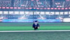 Roblox Endzone Strike Avatar Wearing Silver Helmet And Blue Sports Strip Running Down The Field In A Stadium Filled With People And Lights