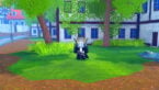 Roblox Anime Ghosts Avatar Wearing Silver Helmet Black Clothes Two Giant Swords On Back Standing On Grass Near Dirt Trees And A Houses