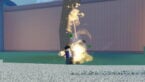 Roblox Shinobi Way Spiky Black Haired Avatar Wearing Blue Summoning Sand From The Ground Causing Dust And Stones To Appear Behind