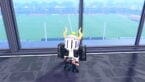 Roblox Soccer Zero Avatar Wearing Silver Helmet Black Clothes Standing Near Window Overlooking A Soccer Pitch