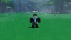 Roblox Evomon Avatar With Brown Hair Wearing Black Clothes Standing On A Green Plain Near Trees And Grass 1