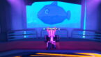 Roblox One Shot Avatar Wearing Silver Helmet Black Clothes Two Giant Swords On Back Standing Before A Giant Fish In An Aquarium